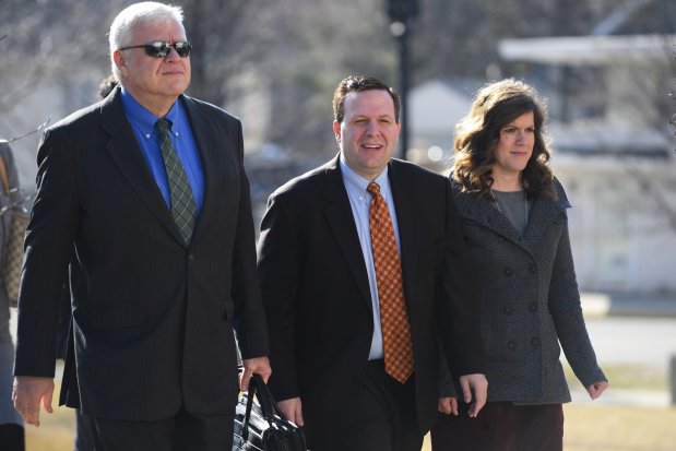 Former Portage Mayor James Snyder arrives with attorney, Jackie Bennett Jr, and his wife, Deborah, to federal court in Hammond on March 15, 2018. (Kyle Telechan/for the Post-Tribune)