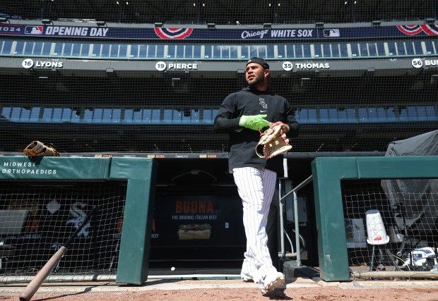 White Sox's Yoán Moncada exits the dugout during a team workout at Guaranteed Rate Field on March 27, 2024. (John J. Kim/Chicago Tribune)