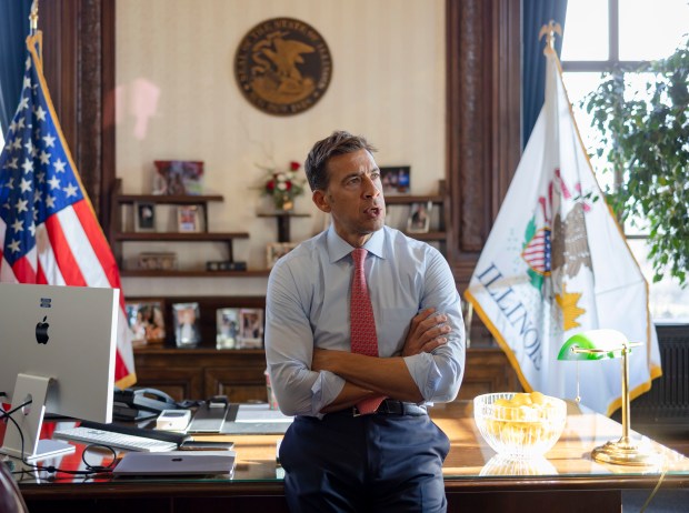 Illinois Secretary of State Alexi Giannoulias talks to staff in his office on his first full day, Jan. 10, 2023 at the Illinois State Capitol in Springfield. (Brian Cassella/Chicago Tribune)