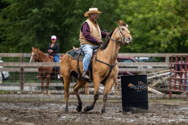 Calvin White, 85, from Gary, competes in junior barrels in the 9th Annual Rodeo at Brown Family Ranch on Sept. 28, 2024. (Tess Crowley/Chicago Tribune)