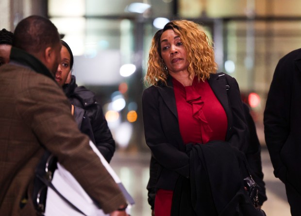 Former state lawmaker Annazette Collins speaks to her attorney in the lobby of Dirksen U.S. Courthouse on Feb. 12, 2024, after she was convicted on four tax-related charges. (Eileen T. Meslar/Chicago Tribune)