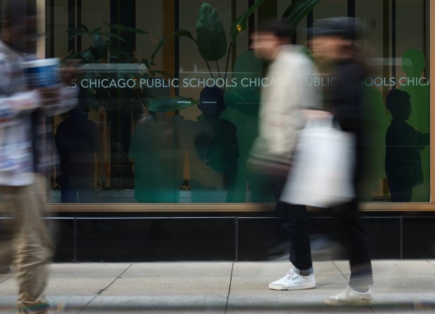 People walk past the Chicago Public Schools central office at 42 W. Madison St. Thursday, Oct. 31, 2024, in Chicago. (John J. Kim/Chicago Tribune)