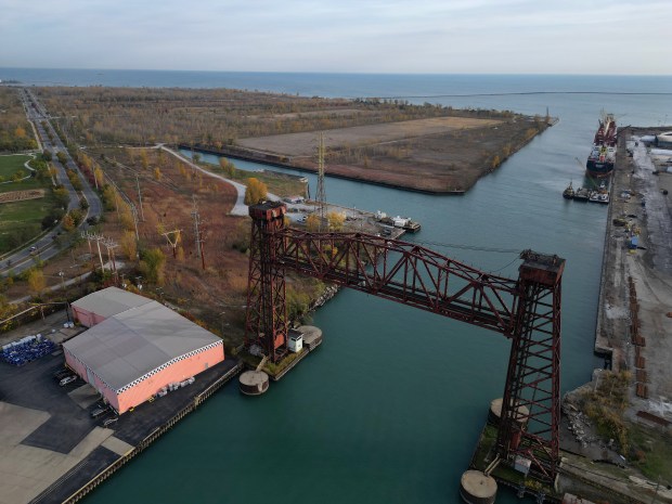 An empty parcel of land, top, is all that remains of the former U.S. Steel South Works site on Oct. 22, 2024. The land is surrounded by water on three sides including Lake Michigan to the east and the Calumet River to the south. PsiQuantum has plans to anchor the new Illinois Quantum & Microelectronics Park, a 128-acre quantum campus on the border between Illinois and Indiana. (Stacey Wescott/Chicago Tribune)