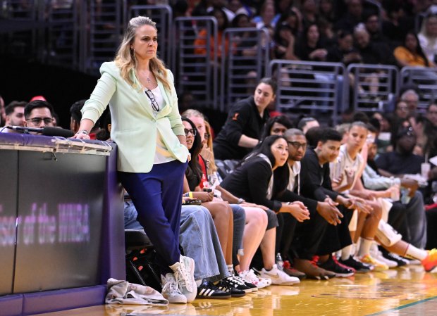 Las Vegas Aces coach Becky Hammon looks on during a game in Los Angeles on July 5, 2024. Assistant coach Tyler Marsh is pictured on the bench. (Keith Birmingham/Pasadena Star-News)