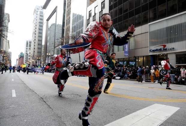 Performers march down State Street during the 90th Chicago Thanksgiving Parade on Nov. 28, 2024. (Antonio Perez/Chicago Tribune)