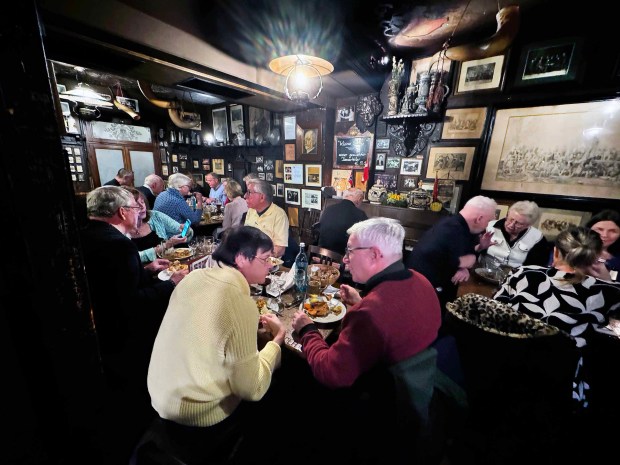 A group dinner at Zum Roten Ochsen in Heidelberg, a pub that has been serving the university population since 1703. (Alan Behr/TNS)