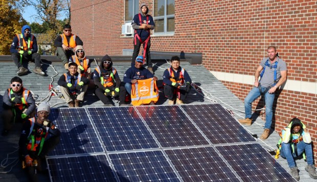 Class members take a break from work. (Courtesy of YouthBuild Lake County)