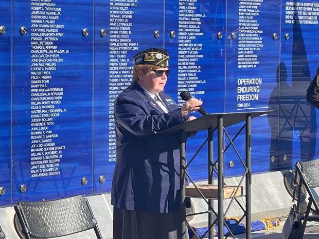 Christine Candelario, the commander of the Evanston American Legion Post 42, spoke at a Veteran's Day ceremony hosted by the city of Evanston at Fountain Square on Nov. 11, 2024. (Richard Requena/Pioneer Press)