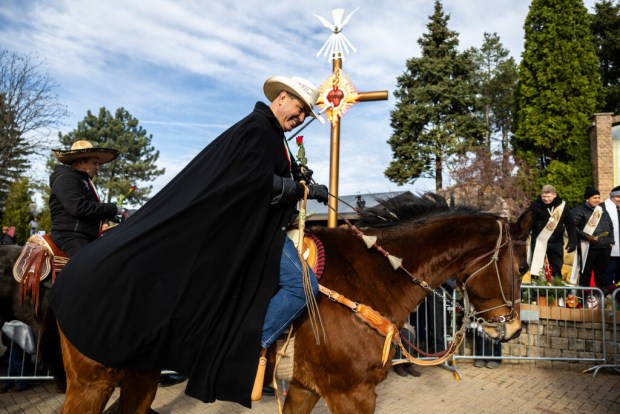 Riders from Club Los Vaqueros Unidos finish the Archdiocese of Chicago's 13th Annual Horseback Pilgrimage at the Shrine of Our Lady of Guadalupe in Des Plaines on Dec. 7, 2024. (Tess Crowley/Chicago Tribune)