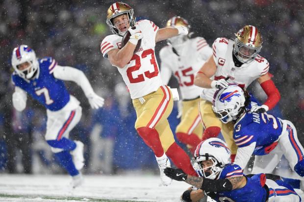 49ers running back Christian McCaffrey runs against Bills safety Taylor Rapp during the first half on Dec. 1, 2024, in Orchard Park, N.Y. (Adrian Kraus/AP)