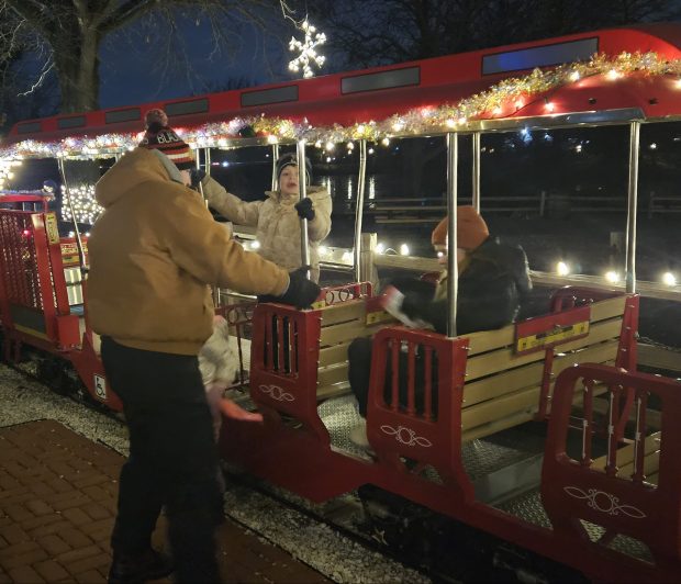 The Holiday Express train is a popular attraction at the ongoing holiday festival at Blackberry Farm in Aurora. (David Sharos / For The Beacon-News)