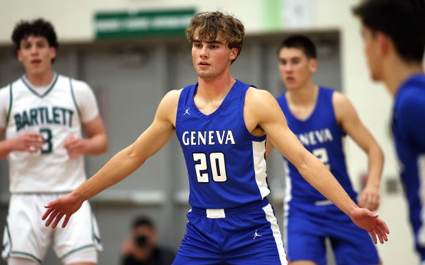 Geneva's Jack Hatton (20) defends the lane in the second quarter against Bartlett during a nonconference game in Bartlett on Tuesday, Dec. 3, 2024.(H. Rick Bamman/for the Beacon-News)