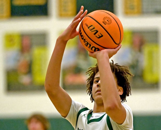 Waubonsie Valley's Kris Mporokoso shoots a free throw. Waubonsie Valley defeated Oswego 76-42 in a boys basketball game Saturday, Dec. 14, 2024, in Aurora, Illinois. (Jon Langham/for the Beacon-News)