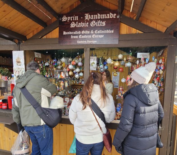 Attendance is up this year at the Christkindlmarket at RiverEdge Park in Aurora, which features more than 60 vendors. (David Sharos / For The Beacon-News)