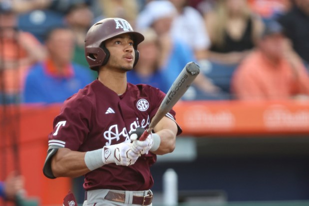 Texas A&M outfielder Braden Montgomery watches his three-run homer against Florida on March 16, 2024, in Gainesville, Fla. (AP Photo/Gary McCullough)