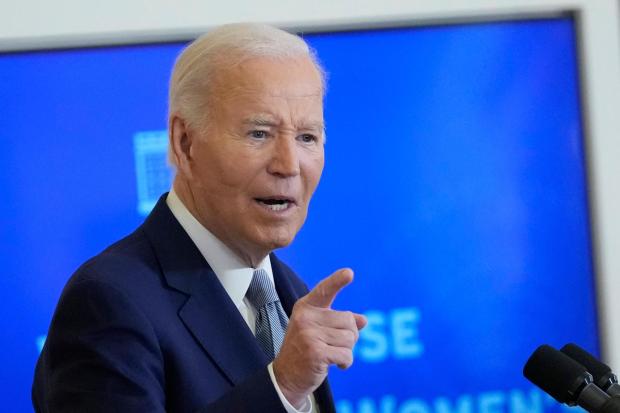 President Joe Biden speaks at the White House Conference on Women's Health Research from the East Room of the White House in Washington, Wednesday, Dec. 11, 2024. (AP Photo/Susan Walsh)