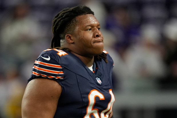 Bears defensive tackle Jonathan Ford stands on the field before a game against the Vikings on Dec. 16, 2024, in Minneapolis. (AP Photo/Abbie Parr)