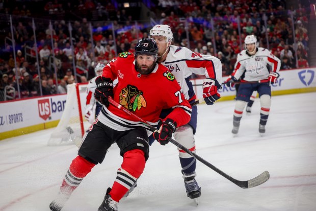 Washington Capitals defenseman John Carlson (74) guards Chicago Blackhawks left wing Patrick Maroon (77) during the first period at the United Center Tuesday Dec. 17, 2024, in Chicago. (Armando L. Sanchez/Chicago Tribune)