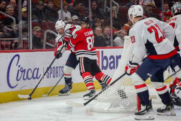 Chicago Blackhawks center Teuvo Teravainen (86) guards Washington Capitals defenseman John Carlson (74) while he handles the puck during the first period at the United Center Tuesday Dec. 17, 2024, in Chicago. (Armando L. Sanchez/Chicago Tribune)