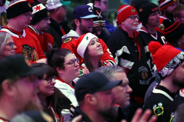 Blackhawks fans listen as former Chicago Blackhawk Jeremy Roenick, newly inducted into the Hockey Hall of Fame, participates in a question and answer session before the start of a game against the Seattle Kraken at the United Center in Chicago on Dec. 19, 2024. (Terrence Antonio James/Chicago Tribune)