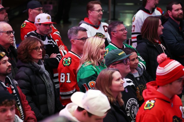 Blackhawks fans listen as former Chicago Blackhawk Jeremy Roenick, newly inducted into the Hockey Hall of Fame, participates in a question and answer session before the start of a game against the Seattle Kraken at the United Center in Chicago on Dec. 19, 2024. (Terrence Antonio James/Chicago Tribune)