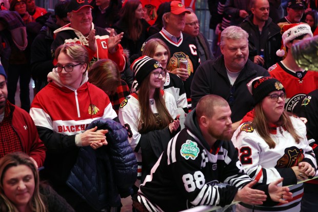 Blackhawks fans listen as former Chicago Blackhawk Jeremy Roenick, newly inducted into the Hockey Hall of Fame, participates in a question and answer session before the start of a game against the Seattle Kraken at the United Center in Chicago on Dec. 19, 2024. (Terrence Antonio James/Chicago Tribune)