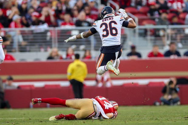 Chicago Bears safety Jonathan Owens (36) jumps over San Francisco 49ers wide receiver Ricky Pearsall (14) during the third quarter at Levi's Stadium Sunday Dec. 8, 2024, in Santa Clara, Calif. (Armando L. Sanchez/Chicago Tribune)