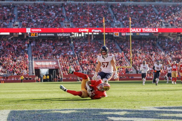 49ers running back Isaac Guerendo makes a catch near the end zone during the first quarter on Dec. 8, 2024, in Santa Clara, Calif. (Armando L. Sanchez/Chicago Tribune)