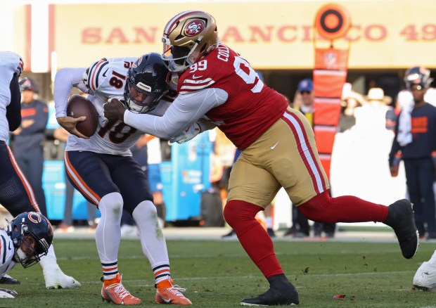 Bears quarterback Caleb Williams is sacked by 49ers defensive tackle Maliek Collins in the second quarter at Levi's Stadium on Dec. 8, 2024. (John J. Kim/Chicago Tribune)