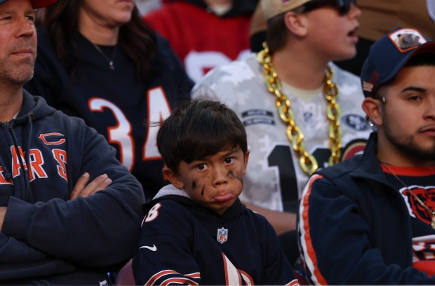 A young Bears fan pouts after the 49ers score a field goal to go up 24-0 in the second quarter at Levi's Stadium on Dec. 8, 2024, in Santa Clara. (John J. Kim/Chicago Tribune)