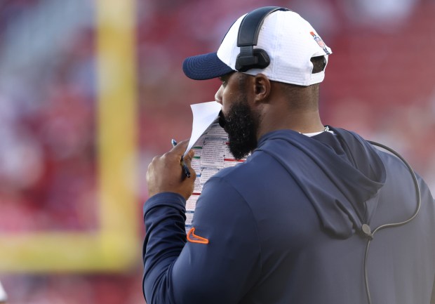 Bears interim head coach Thomas Brown covers his mouth while watching the fourth quarter against the 49ers at Levi's Stadium on Dec. 8, 2024, in Santa Clara. (John J. Kim/Chicago Tribune)