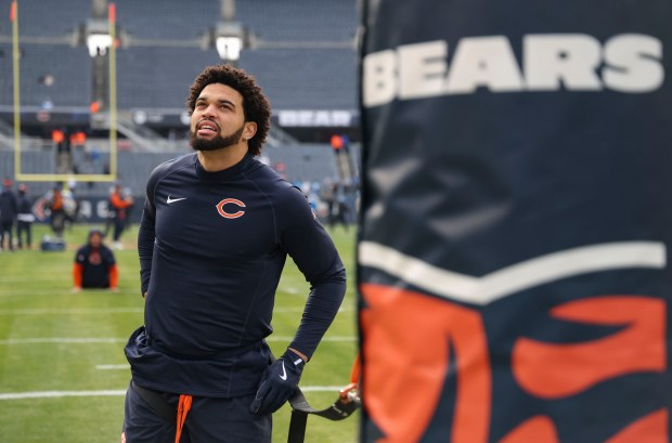 Chicago Bears quarterback Caleb Williams warms up to face the Detroit Lions before the game at Soldier Field. (Brian Cassella/Chicago Tribune)