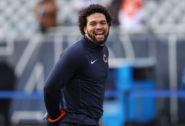 Bears quarterback Caleb Williams warms up to face the Detroit Lions before the game on Dec. 22, 2024, at Soldier Field. (Brian Cassella/Chicago Tribune)