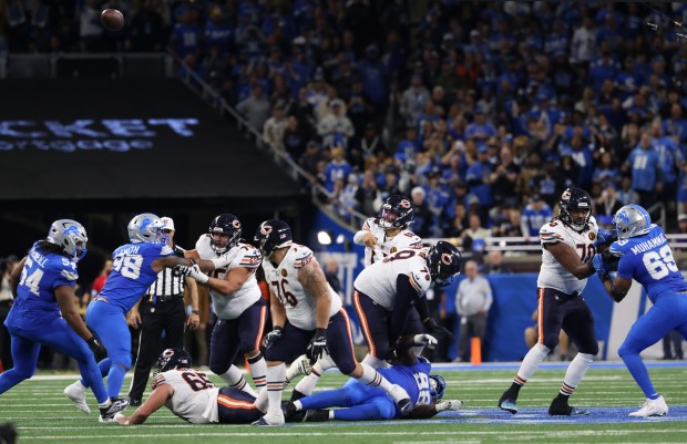 Bears quarterback Caleb Williams (18) throws the final ball of the game as time runs out for a 23-20 loss the Lions at Ford Field on Nov. 28, 2024, in Detroit. (John J. Kim/Chicago Tribune)