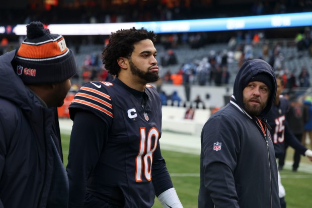 Chicago Bears quarterback Caleb Williams walks off the field after the loss to the Detroit Lions on Sunday, Dec. 22, 2024, at Soldier Field. (Brian Cassella/Chicago Tribune)