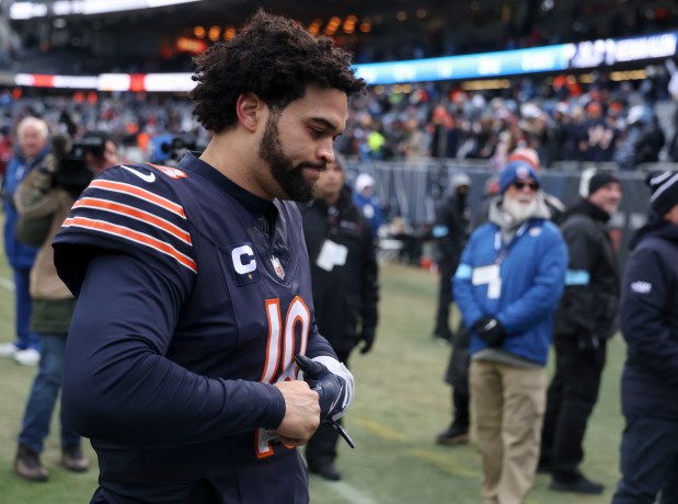 Bears quarterback Caleb Williams walks off the field after the 34-17 loss to the Lions on Dec. 22, 2024, at Soldier Field. (Brian Cassella/Chicago Tribune)