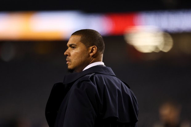 Bears general manager Ryan Poles stands on the field before the game against the Seattle Seahawks at Soldier Field on Dec. 26, 2024. (Eileen T. Meslar/Chicago Tribune)