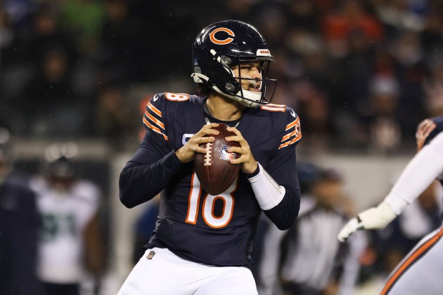 Chicago Bears quarterback Caleb Williams (18) looks to pass the ball during the first quarter against the Seattle Seahawks at Soldier Field on Thursday, Dec. 26, 2024. (Eileen T. Meslar/Chicago Tribune)