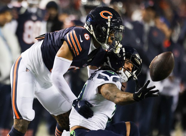 Chicago Bears cornerback Kyler Gordon (6) breaks up a pass to Seattle Seahawks wide receiver Jaxon Smith-Njigba (11) during the first quarter at Soldier Field on Thursday, Dec. 26, 2024. (Eileen T. Meslar/Chicago Tribune)