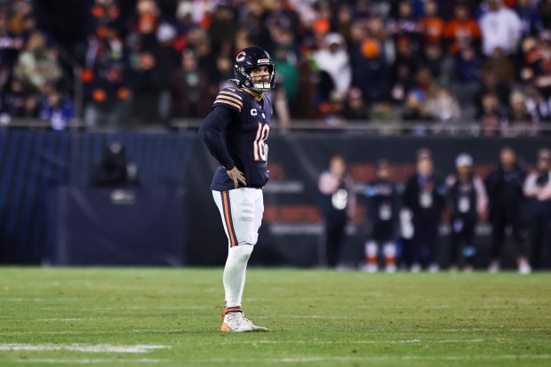 Bears quarterback Caleb Williams stands on the field as the Bears trail with little time left in the fourth quarter against the Seahawks at Soldier Field on Dec. 26, 2024. (Eileen T. Meslar/Chicago Tribune)