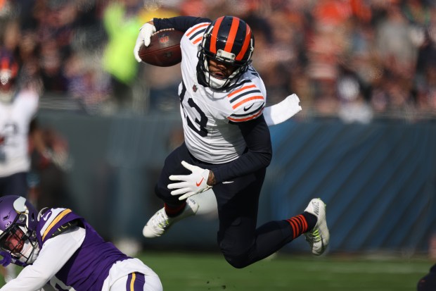 Bears wide receiver Keenan Allen gets stopped after a first-quarter reception against the Vikings on Sunday, Nov. 24, 2024, at Soldier Field. (Eileen T. Meslar/Chicago Tribune)