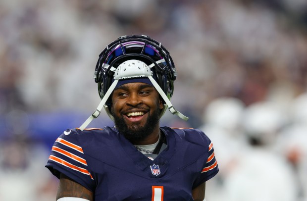 Bears cornerback Jaylon Johnson smiles as he chats with officials during a commercial in the second half against the Vikings at U.S Bank Stadium on Dec. 16, 2024, in Minneapolis. (Stacey Wescott/Chicago Tribune)