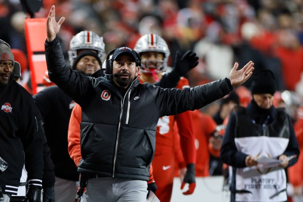 Ohio State coach Ryan Day reacts to a video replay during the first half of a first-round College Football Playoff game against Tennessee on Saturday, Dec. 21, 2024, in Columbus, Ohio. (AP Photo/Jay LaPrete)