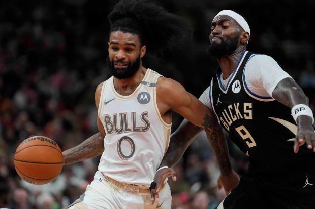 Bucks forward Bobby Portis Jr. defends Bulls guard Coby White during the second half Saturday, Dec. 28, 2024, at the United Center. (AP Photo/Erin Hooley)