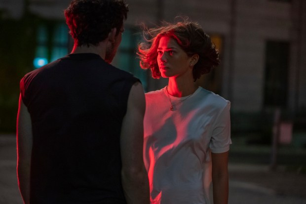 Zendaya (right, with Josh O'Connor) plays a former tennis pro turned fiercely competitive and romantically conflicted coach in "Challengers." (MGM)