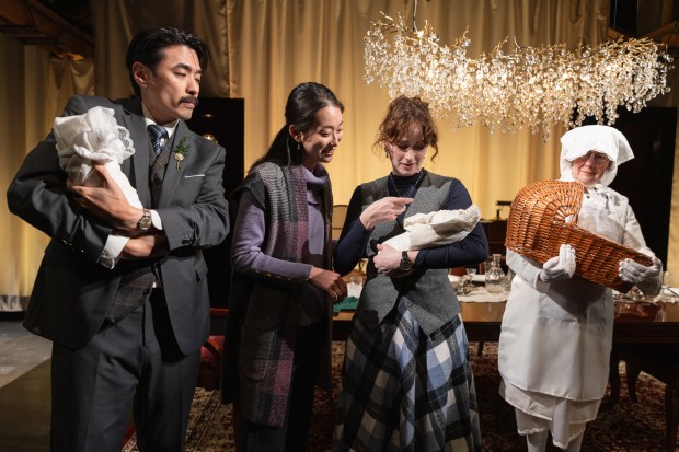 Huy Nguyen, Seoyoung Park, Charlie Irving and Joan Merlo in "The Long Christmas Dinner" by TUTA at the Bramble Arts Loft in Chicago. (Josh Bernaski)