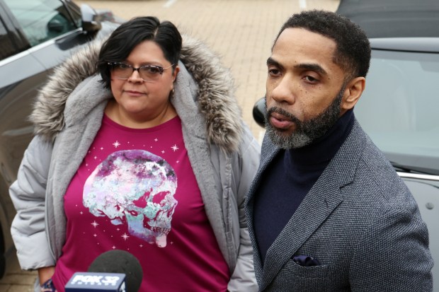 Chicago Board of Education board member Olga Bautista, left, and President Sean B. Harden speak with reporters outside the Chicago Teachers Union Center after a teachers contract negotiation meeting on Dec. 23, 2024. (Terrence Antonio James/Chicago Tribune)