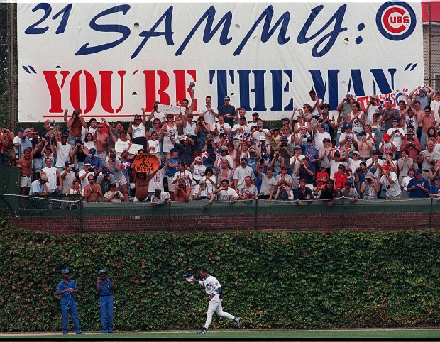 Cubs slugger Sammy Sosa does a hero's trot through the Wrigley Field outfield during a ceremony to honor him during his 66-home run season on Sept. 20, 1998. (Phil Velasquez/Chicago Tribune)