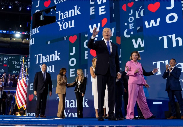 President Joe Biden leaves the stage to applause, Aug. 19, 2024, during the Democratic National Convention at the United Center. (Brian Cassella/Chicago Tribune)