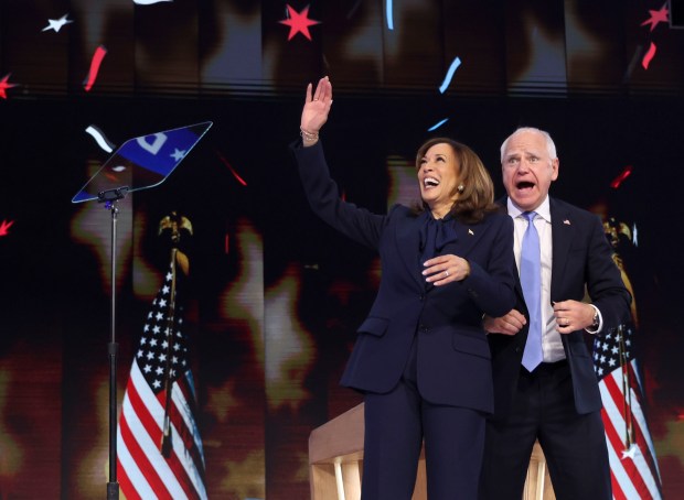 Democratic presidential nominee Vice President Kamala Harris celebrates her nomination with vice presidential nominee Minnesota Gov. Tim Walz, Aug. 22, 2024, during the Democratic National Convention at the United Center. (Brian Cassella/Chicago Tribune)